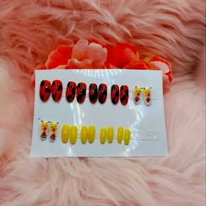 Custom press on nails 20 piece set of pokémon yellow black red with  Pikachu